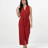 Enterizo rojo sin mangas con cuello mao abierto, botones decorativos, lazo en cintura y pierna culotte, vibrante para eventos y salidas especiales