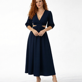 Vestido midi azul marino con escote en V cruzado, manga abullonada, cut out laterales en cintura y falda con vuelo, elegante para eventos y cenas especiales