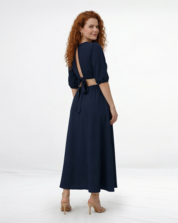 Vestido midi azul marino con escote en V cruzado, manga abullonada, cut out laterales en cintura y falda con vuelo, elegante para eventos y cenas especiales
