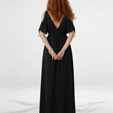 Vestido largo negro cruzado cold shoulder con lazo en manga, cintura elástica y abertura lateral, elegante y versátil para eventos de noche y cócteles