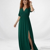 Vestido largo verde cruzado cold shoulder con lazo en puño, cintura fruncida y abertura lateral, vibrante y femenino para eventos especiales y celebraciones