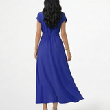 Vestido midi azul cruzado con escote en V, manga corta, cinturón dorado en cintura elástica y falda con vuelo amplio, elegante para eventos y cenas especiales