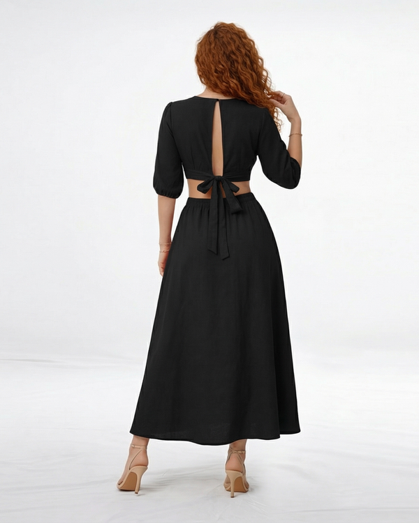 Vestido midi negro con escote en V cruzado, manga 3/4 abullonada y aberturas cut out en cintura, sofisticado para cócteles y salidas de noche