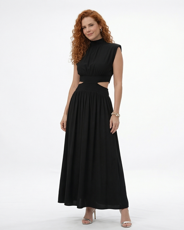 Vestido largo negro cuello alto con abertura cut out en cintura y falda acampanada fruncida, sofisticado y elegante para fiestas, grados y eventos especiales en Colombia