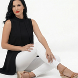 Blusa negra larga sin mangas con cuello alto y solapa delantera asimétrica, elegante para reuniones de trabajo y salidas de noche