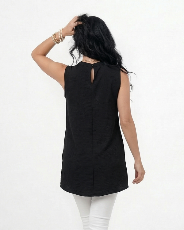 Blusa negra larga sin mangas con cuello alto y solapa delantera asimétrica, elegante para reuniones de trabajo y salidas de noche