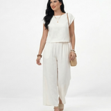 Conjunto blanco crop top con manga tipo volante y pantalón ancho pierna recta con cintura elástica en lino, fresco y femenino para salidas casuales y fincas en Colombia