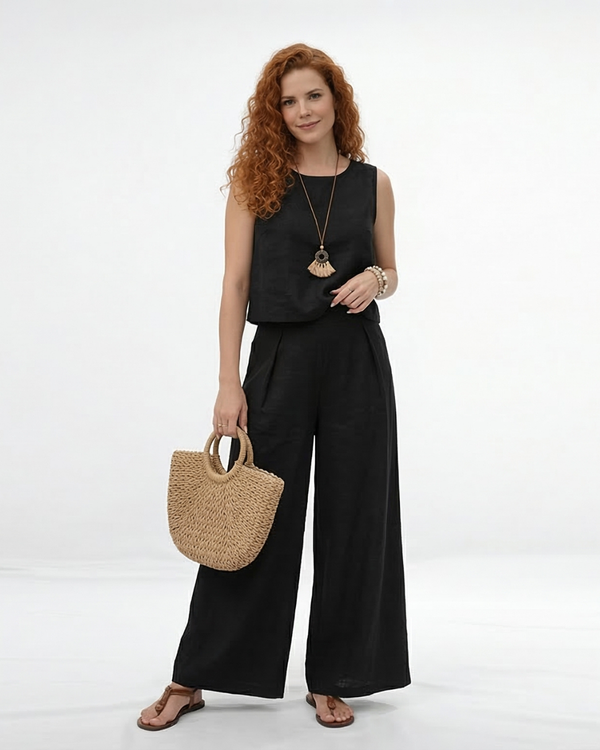 Conjunto negro de top cropped sin mangas con cuello redondo y pantalón palazzo de tiro alto con pinzas, sofisticado y versátil para eventos, reuniones y salidas de noche