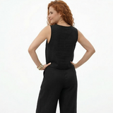 Conjunto negro de top cropped sin mangas con cuello redondo y pantalón palazzo de tiro alto con pinzas, sofisticado y versátil para eventos, reuniones y salidas de noche