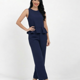 Conjunto azul marino dos piezas top sin mangas cuello redondo con volante peplum y pantalón recto de pierna recta, sofisticado y cómodo para fiestas, grados y salidas elegantes en Colombia
