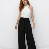 Pantalón ancho negro cintura alta con lazo frontal y pinzas, clásico y versátil para fiestas, grados y salidas elegantes en Colombia