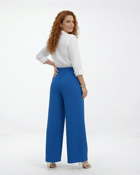 Pantalón ancho azul con diseño cruzado frontal efecto falda y cintura alta, elegante y llamativo para fiestas, grados y matrimonios en Colombia