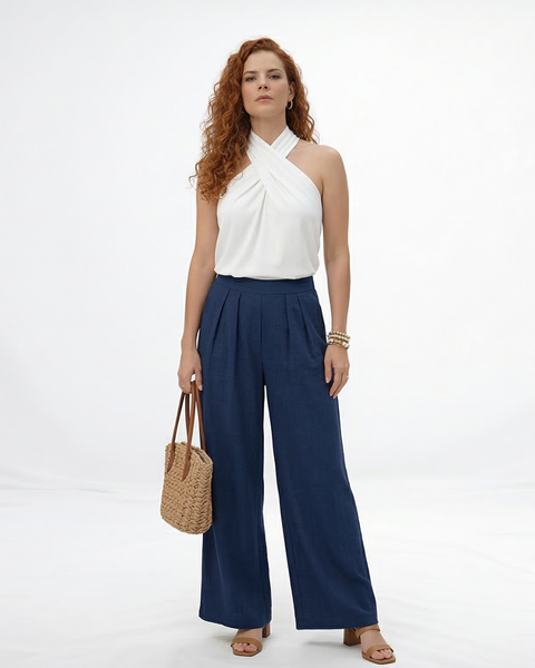 Pantalón palazzo azul marino cintura alta con pinzas frontales y tela fluida tipo lino, elegante para fiestas, grados y matrimonios en Colombia