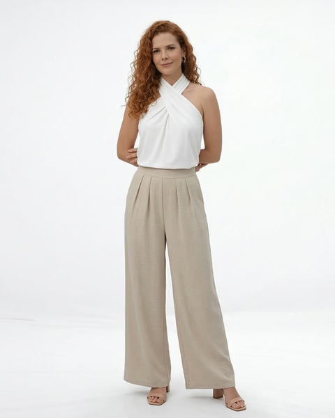 Pantalón palazzo beige cintura alta con pinzas frontales y tela fluida tipo lino, elegante y cómodo para salidas, fiestas y eventos en Colombia