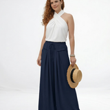 Pantalón palazzo azul marino super fluido con cintura elástica alta, cordón y pinzas frontales, fresco y elegante para fiestas, salidas y viajes en Colombia