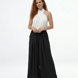 Pantalón palazzo negro super fluido con cintura elástica alta, cordón y pinzas frontales, versátil y sofisticado para fiestas, grados y matrimonios en Colombia