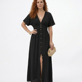 Vestido largo negro con escote en V profundo, botones al frente, manga corta y abertura en la falda, elegante y versátil para eventos formales y salidas de noche