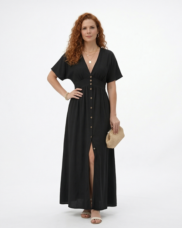 Vestido largo negro con escote en V profundo, botones al frente, manga corta y abertura en la falda, elegante y versátil para eventos formales y salidas de noche