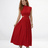 Vestido largo rojo cuello alto con abertura cut out en cintura y falda acampanada fruncida, sensual y elegante para fiestas, grados y matrimonios en Colombia