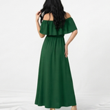 Vestido largo verde con hombros descubiertos, volante en el busto, cintura elástica y abertura frontal en la falda, ideal para matrimonios, fiestas de noche y eventos especiales
